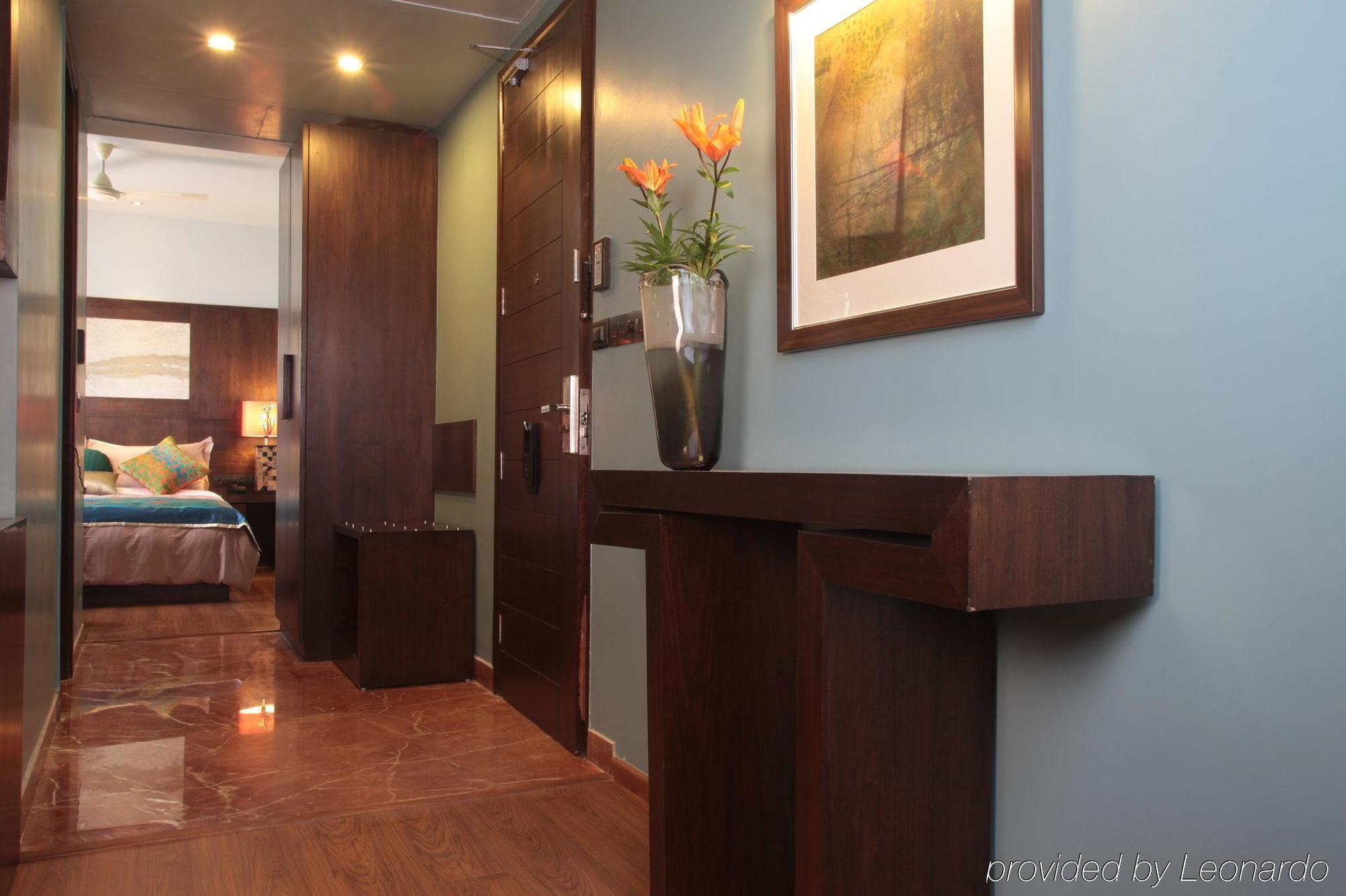 Hotel Justa Mg Road Bengalúr Pokoj fotografie